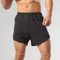 Pantalones cortos atléticos de carreras para hombres pantalones cortos de entrenamiento de entrenamiento en seco